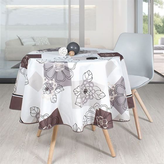 White tablecloth with taupe leaves and flowers.